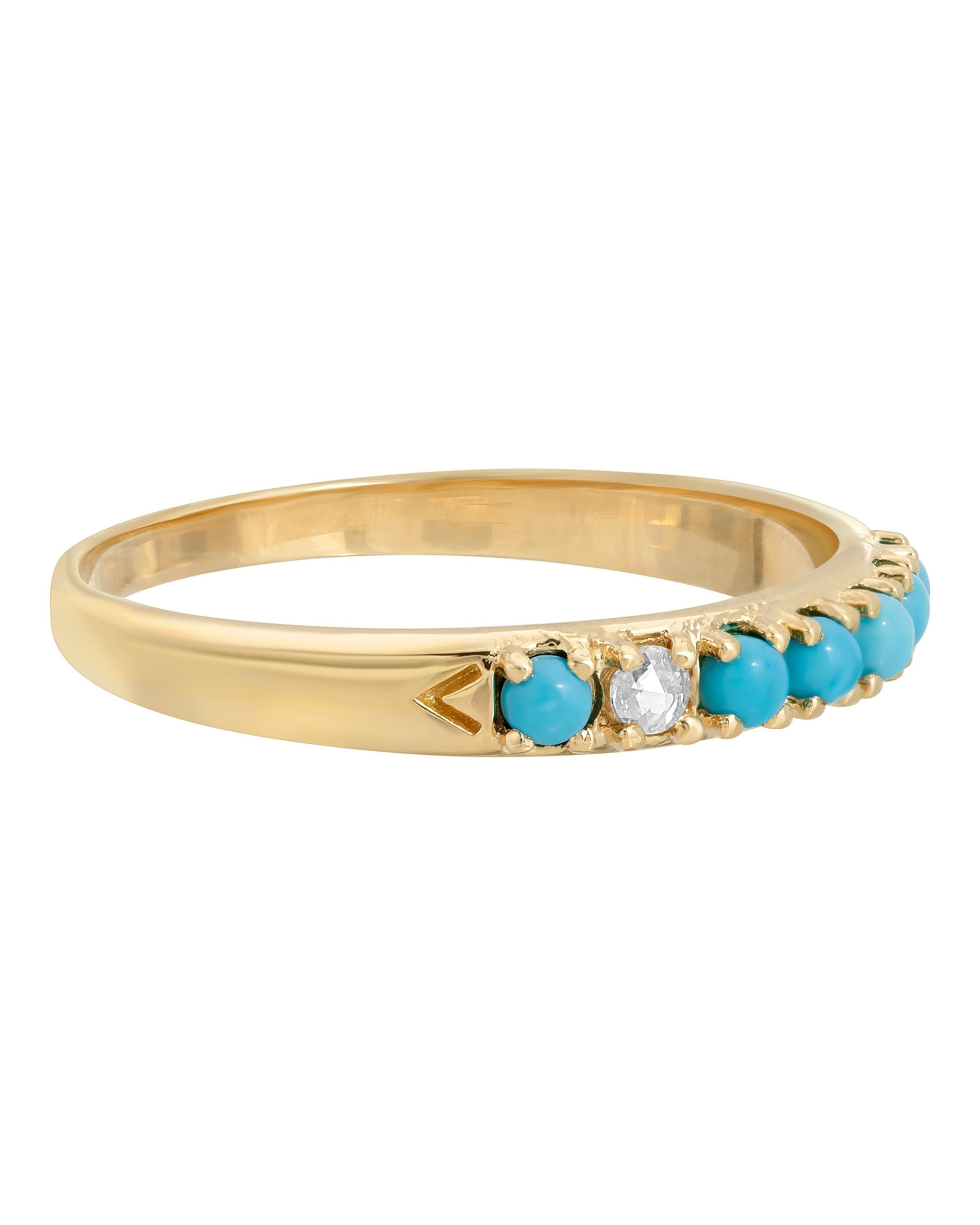 Wylde Ring, 14k yellow gold seven stone band with six sleeping beauty stones and one white diamond, handmade by Turquoise + Tobacco 